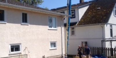 pouring over roof w guys